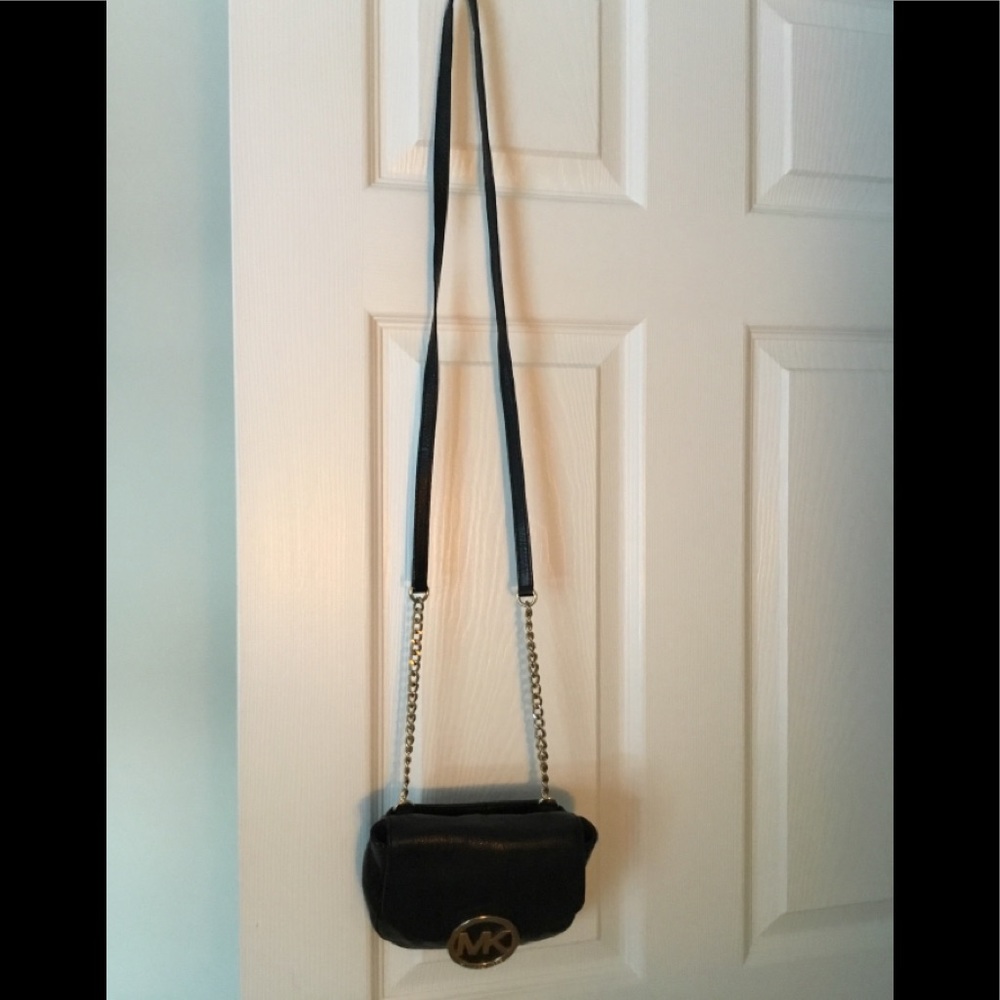 Michael Kors small black crossbody purse.